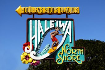 north shore beach and haleiwa town sign